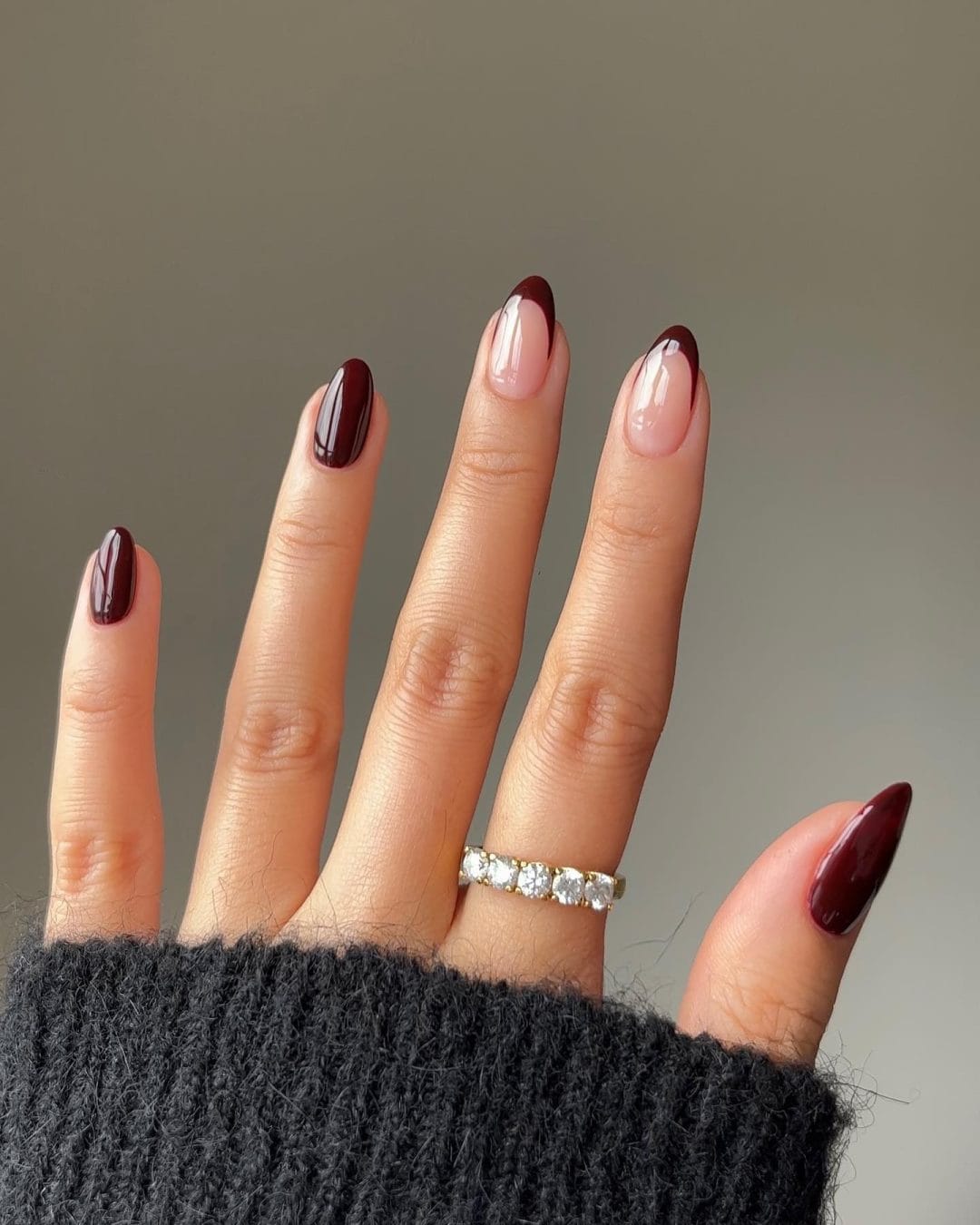 Burgundy French tips with nude base, chic nail art
