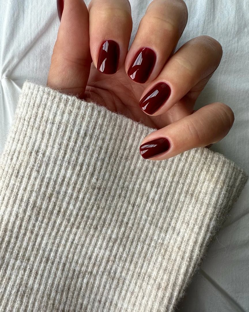 Glossy burgundy nails, elegant simplicity