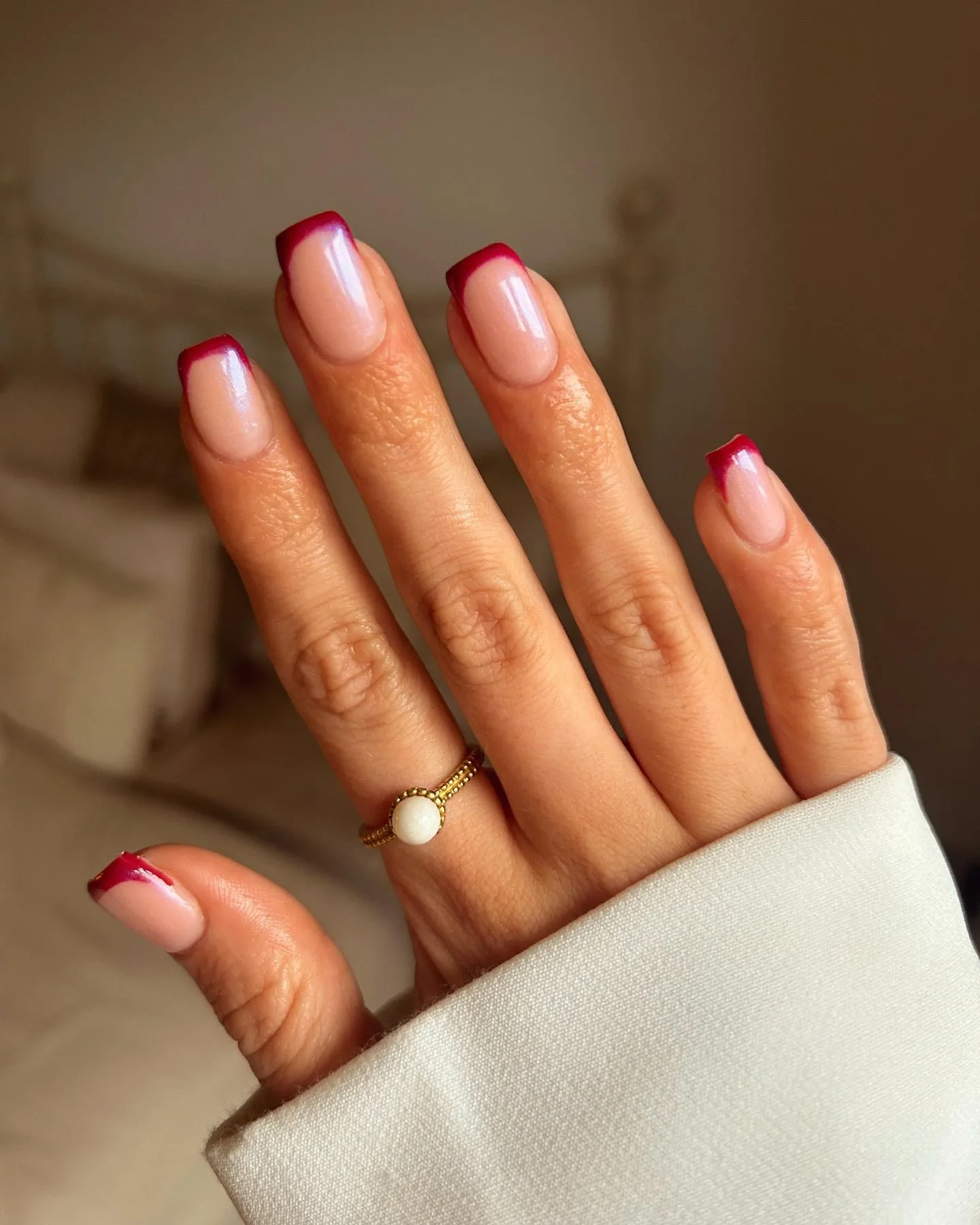 Burgundy micro-French tips, modern elegance