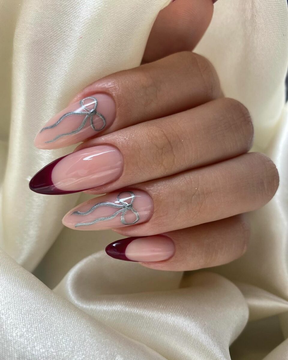 Burgundy tips with silver line art, artistic design
