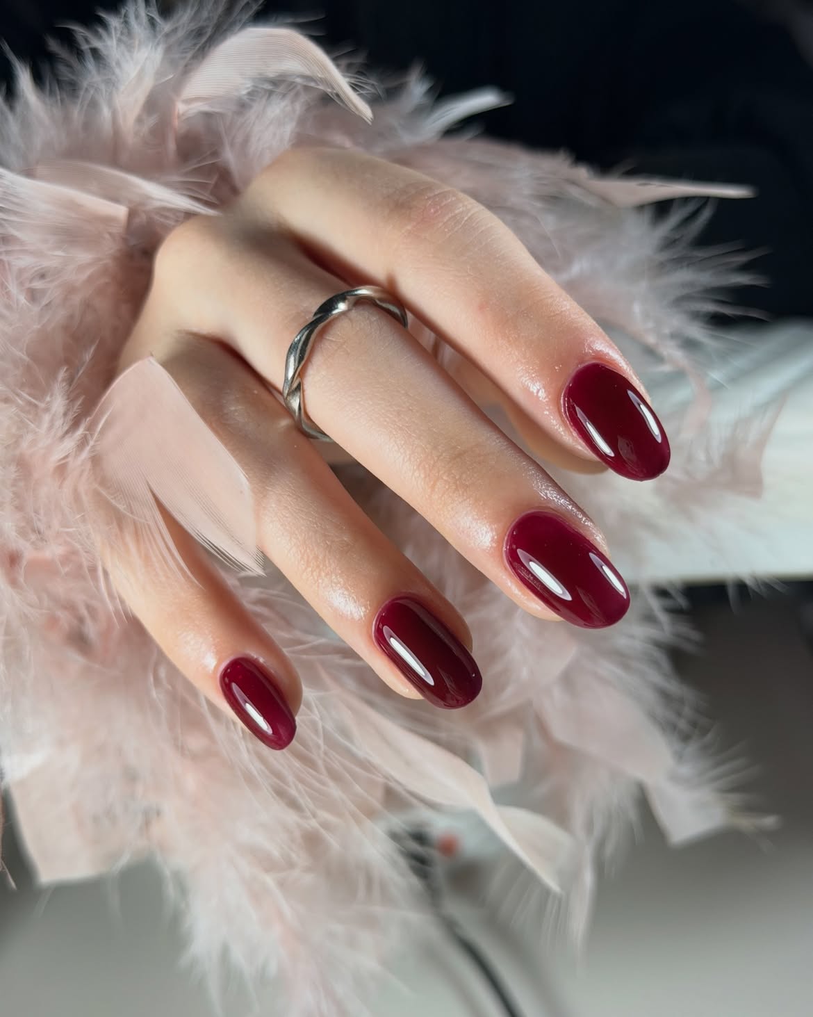Glossy burgundy almond nails, sophisticated style