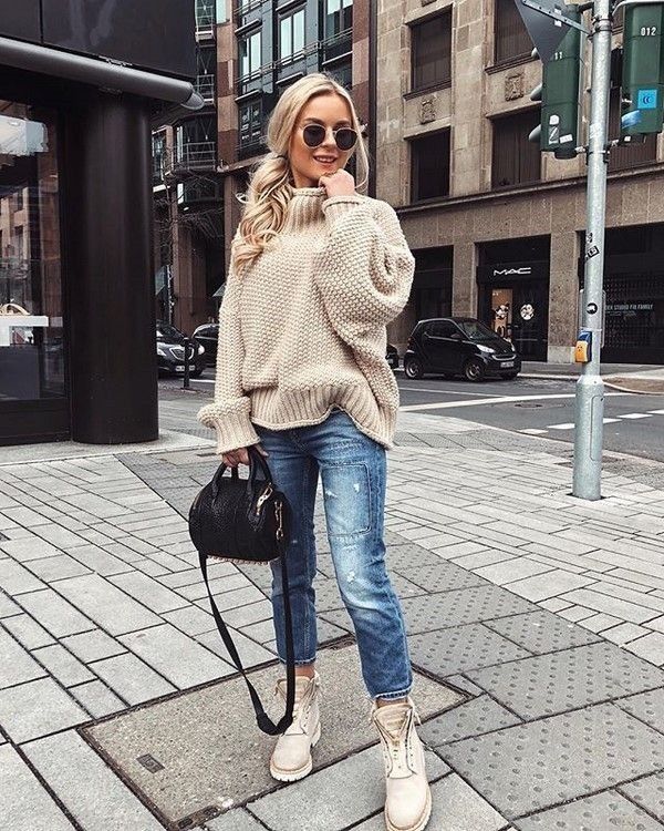 Chunky sweater with distressed jeans, urban casual