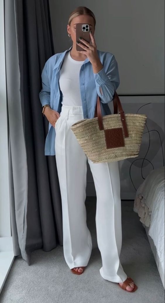 Blue shirt with white pants, laid-back elegance
