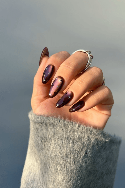 Plum cat eye nails with stars, Pinterest nail art