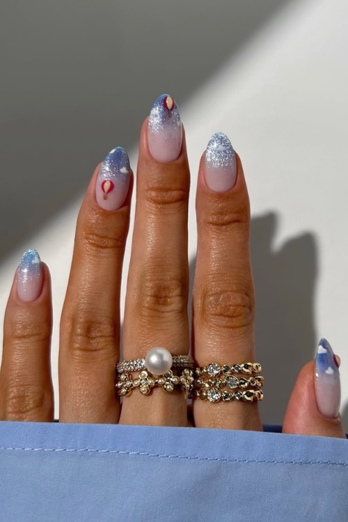 Frosted blue nails with heart accents, Pinterest style