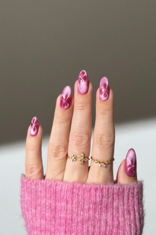 Pink cat eye nails with floral accents, Pinterest nail art