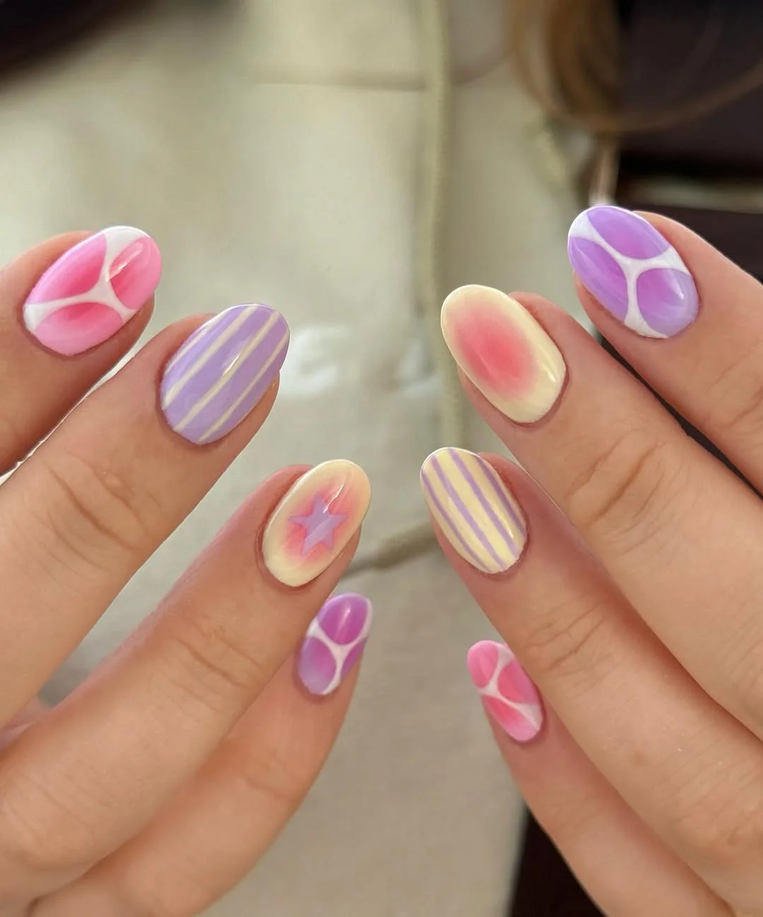 Pastel abstract nails with stripes and gradients