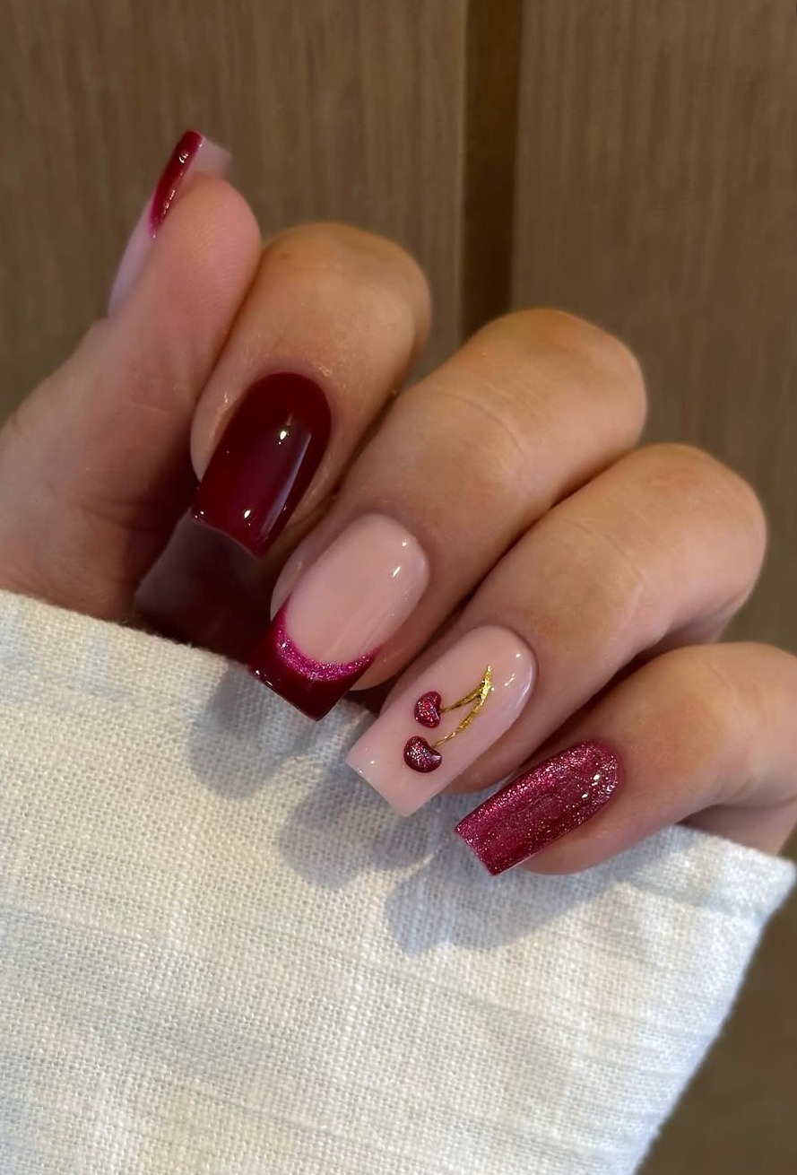 Burgundy square nails with cherry accents