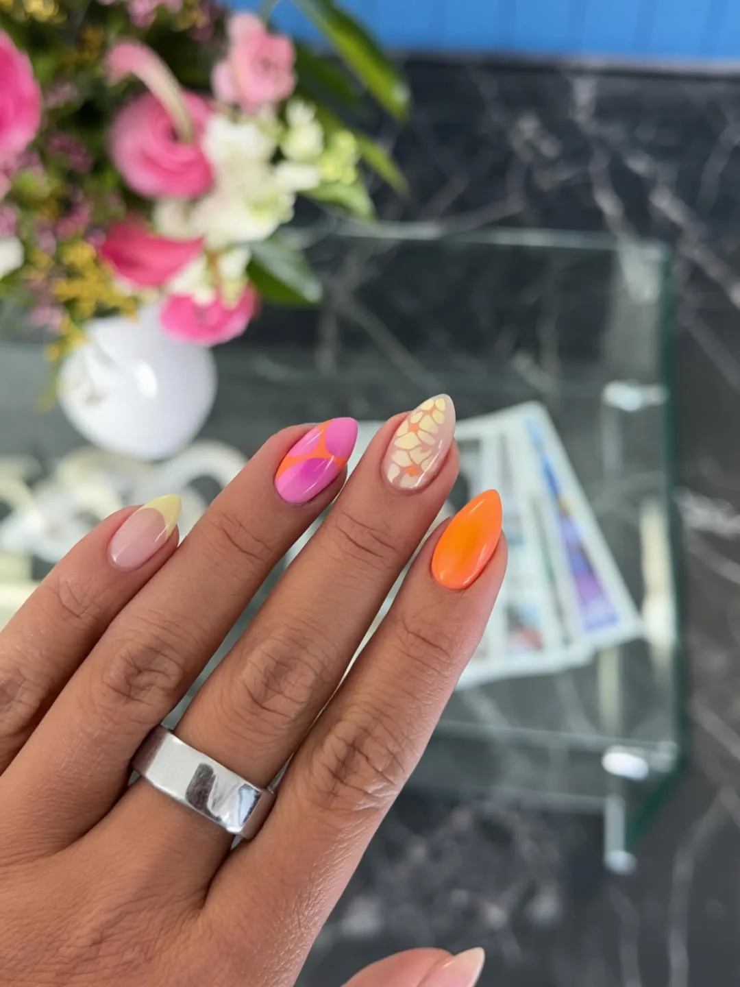Bright almond nails with tropical colors