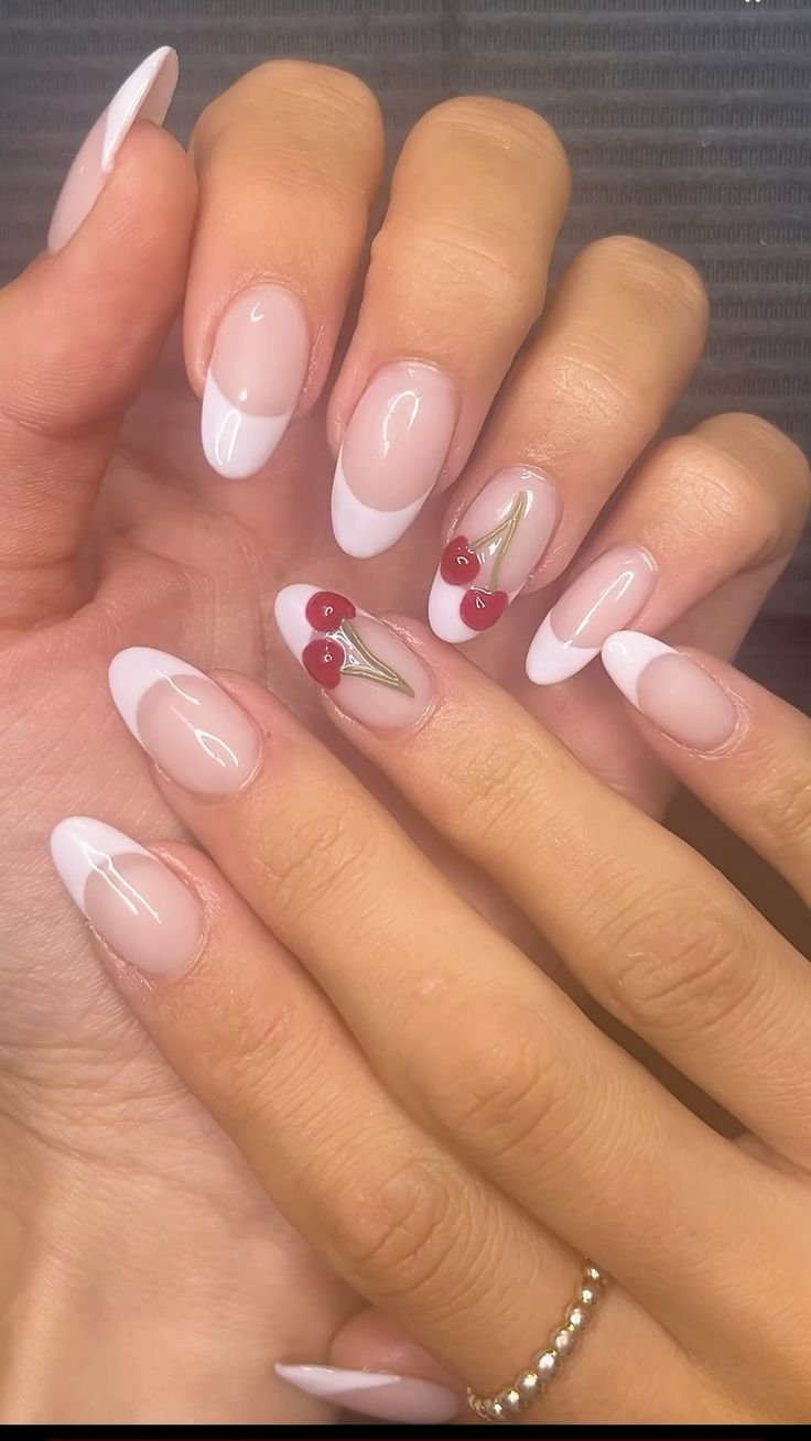 Almond nails with French tips and cherry art