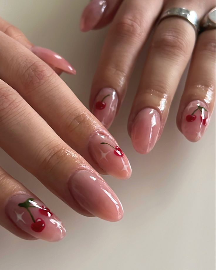 Almond nails with glossy pink and cherry accents