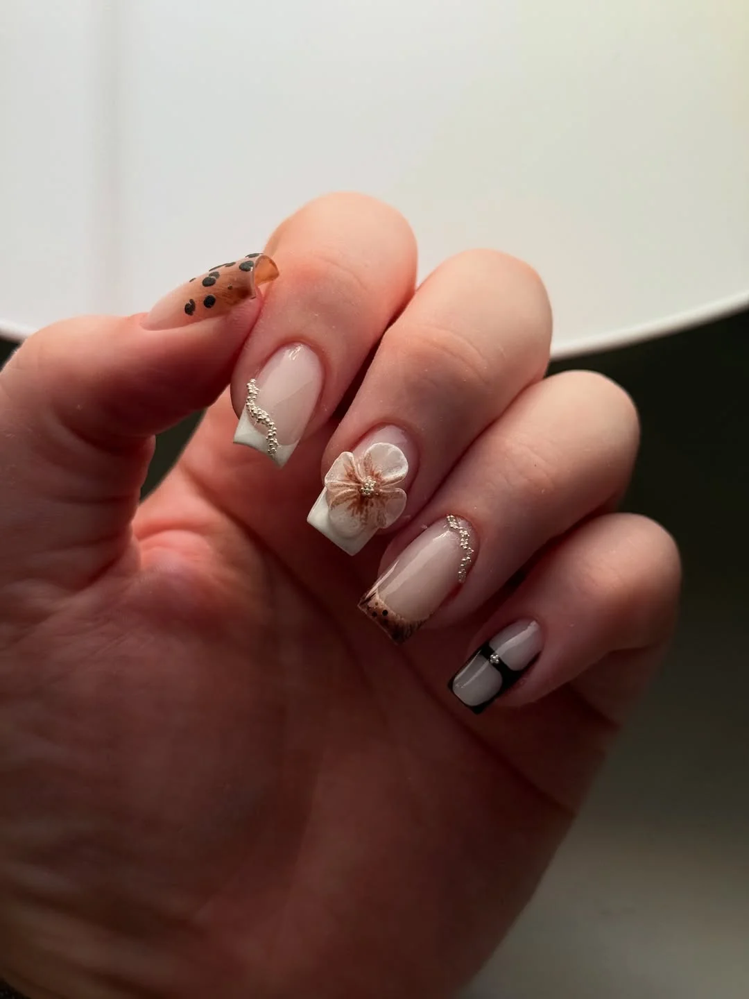 Short nails with mixed patterns and cherry accents