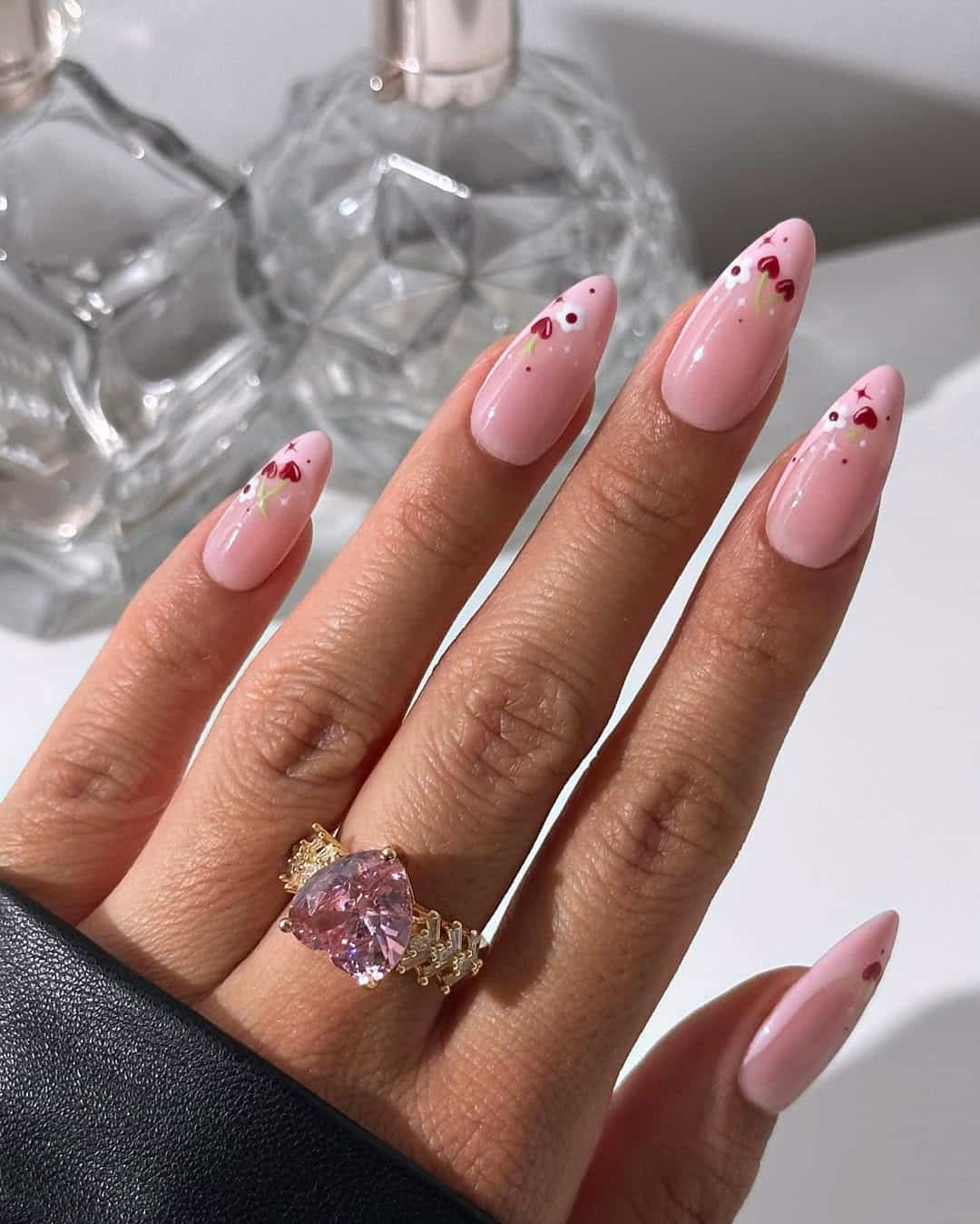 Almond nails with pink base and cherry art