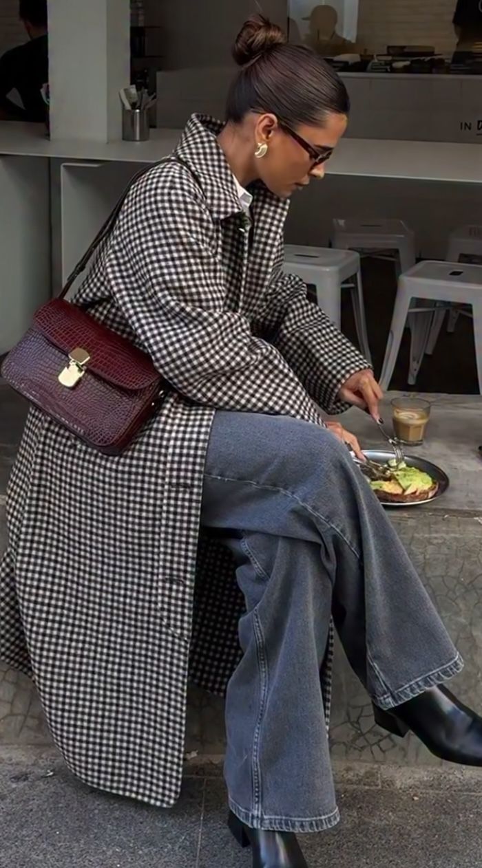 Checkered trench with wide-leg jeans