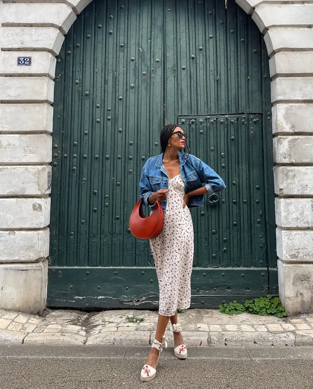 Denim jacket over floral dress