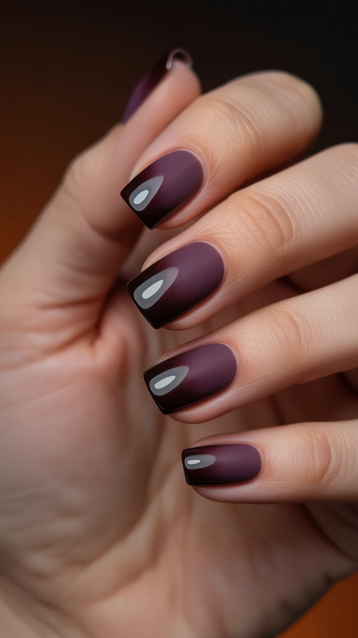 Plum matte French tips for a sophisticated fall look.