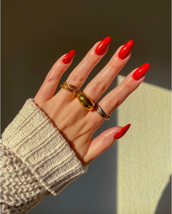 Fiery red almond nails, glossy, bold statement
