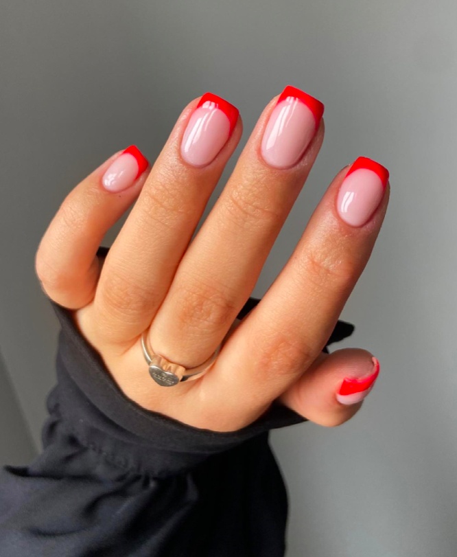 Red French tip nails, short square, modern twist
