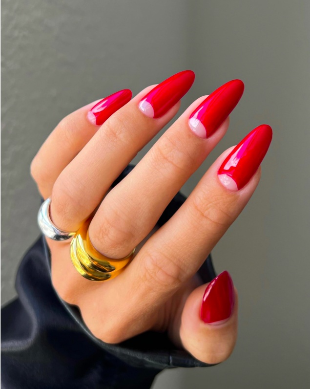 Red half-moon nails, almond shape, chic design