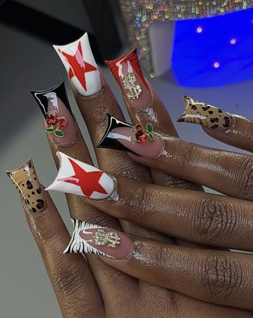 Graphic duck nails with stars and patterns, Pinterest interest bold nails