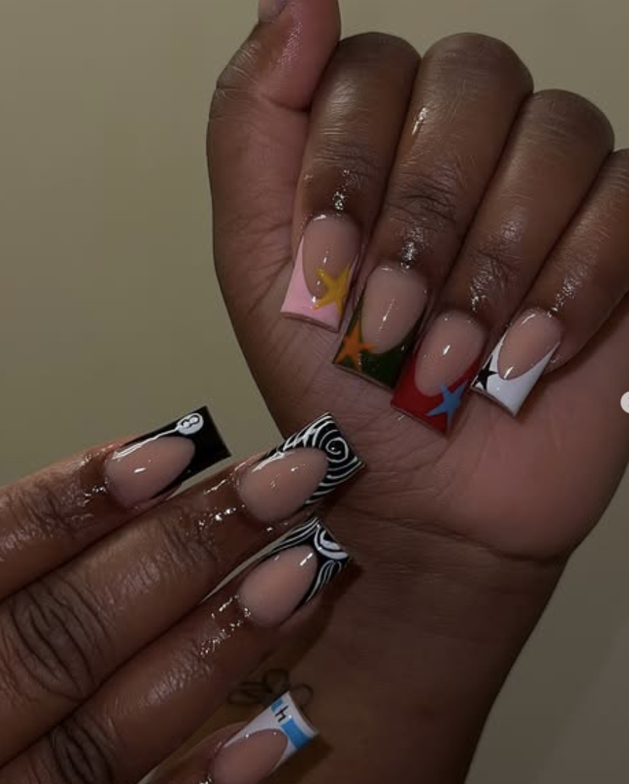 Graphic black and white square nails, bold contrast