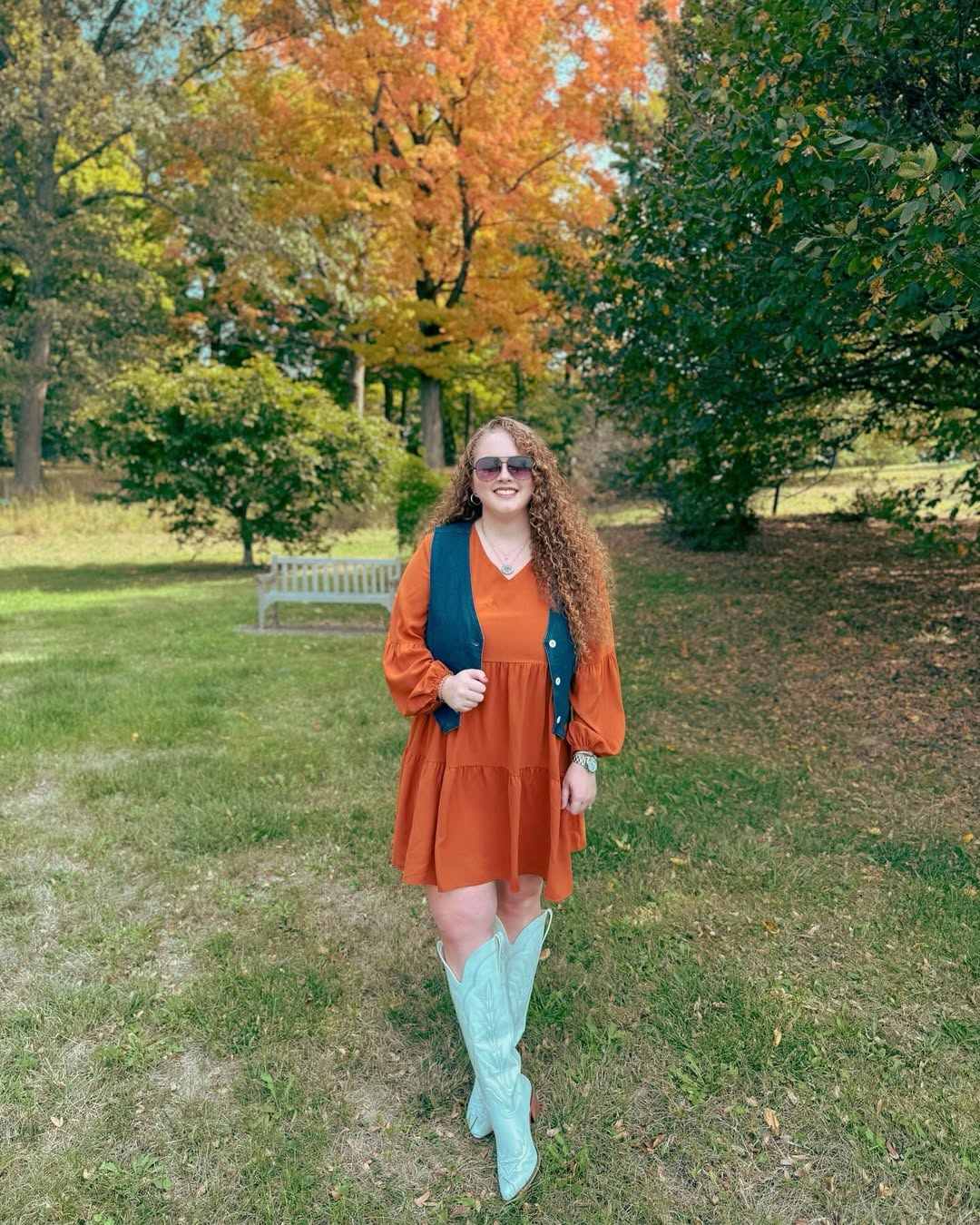 Orange dress with vest and cowboy boots