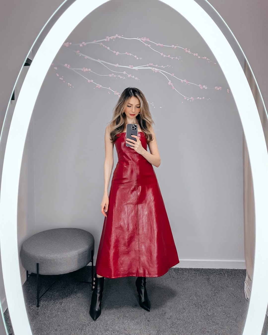 Red leather dress with black boots