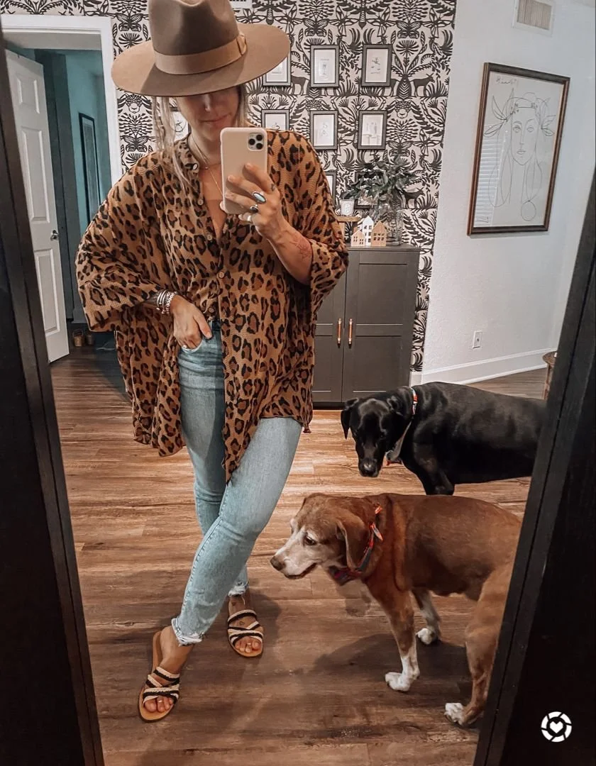 Leopard poncho with blue jeans