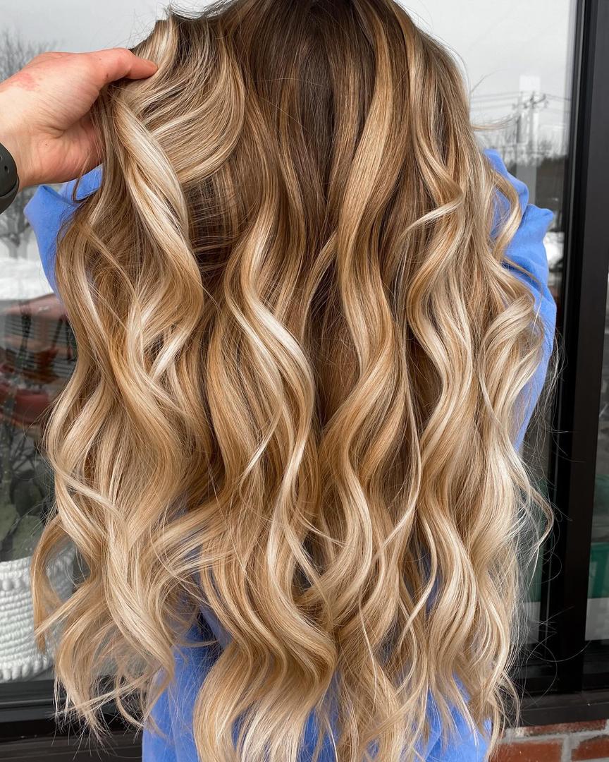 Golden blonde balayage with long layers