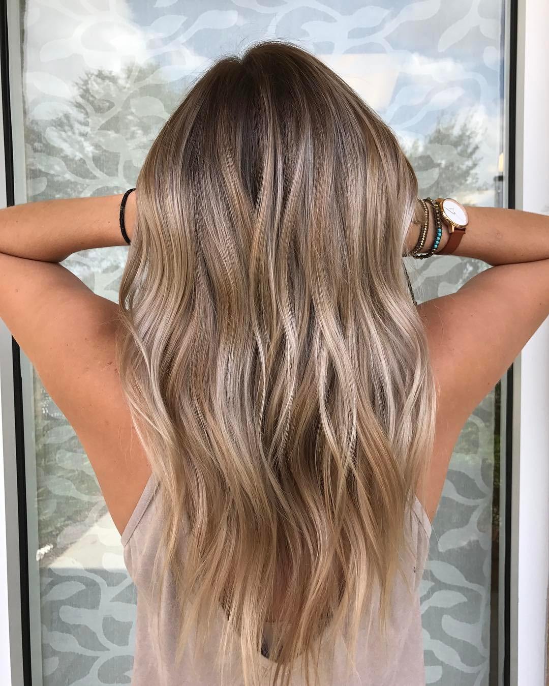 Soft beige blonde hair with layers