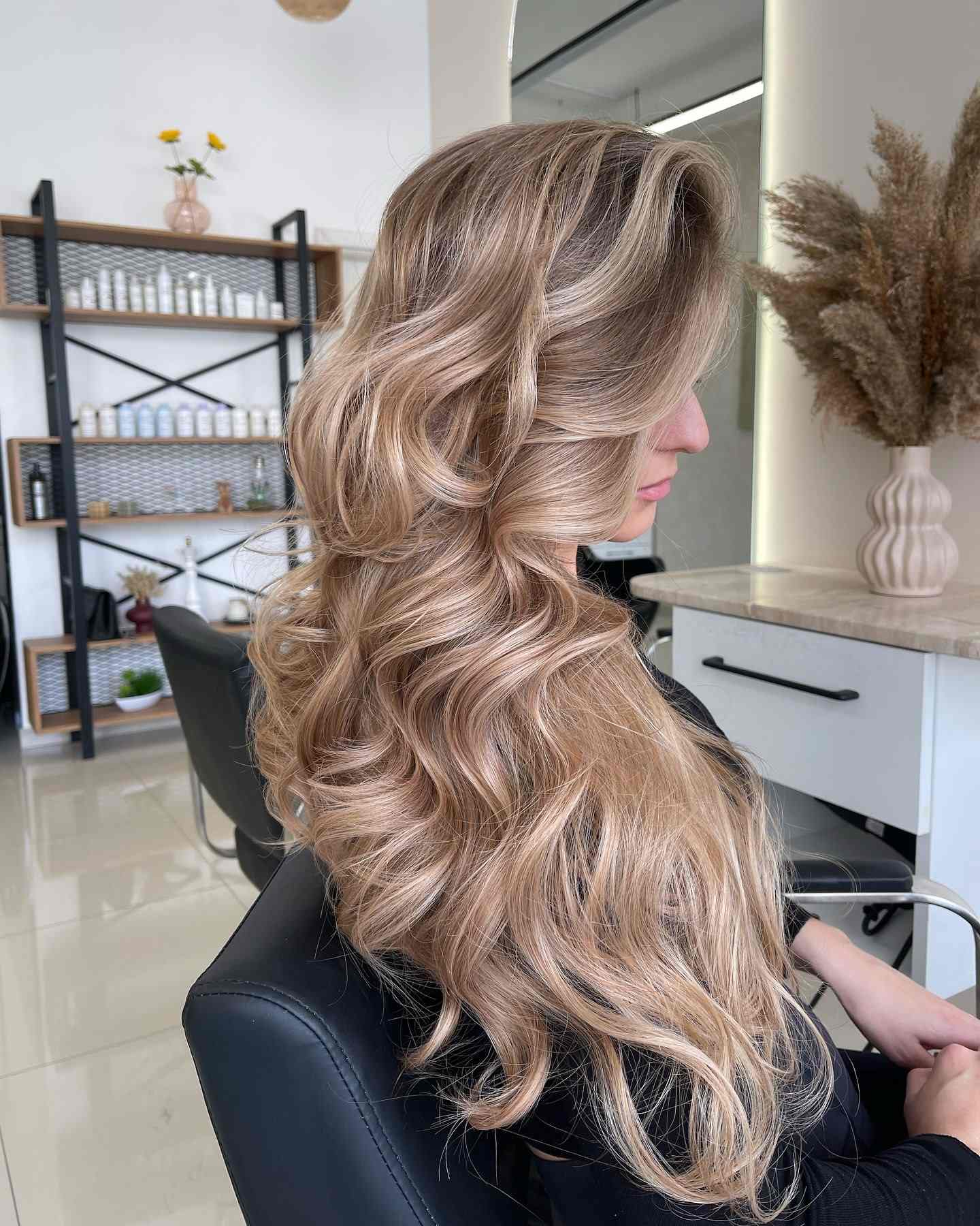 Voluminous blonde curls full of life