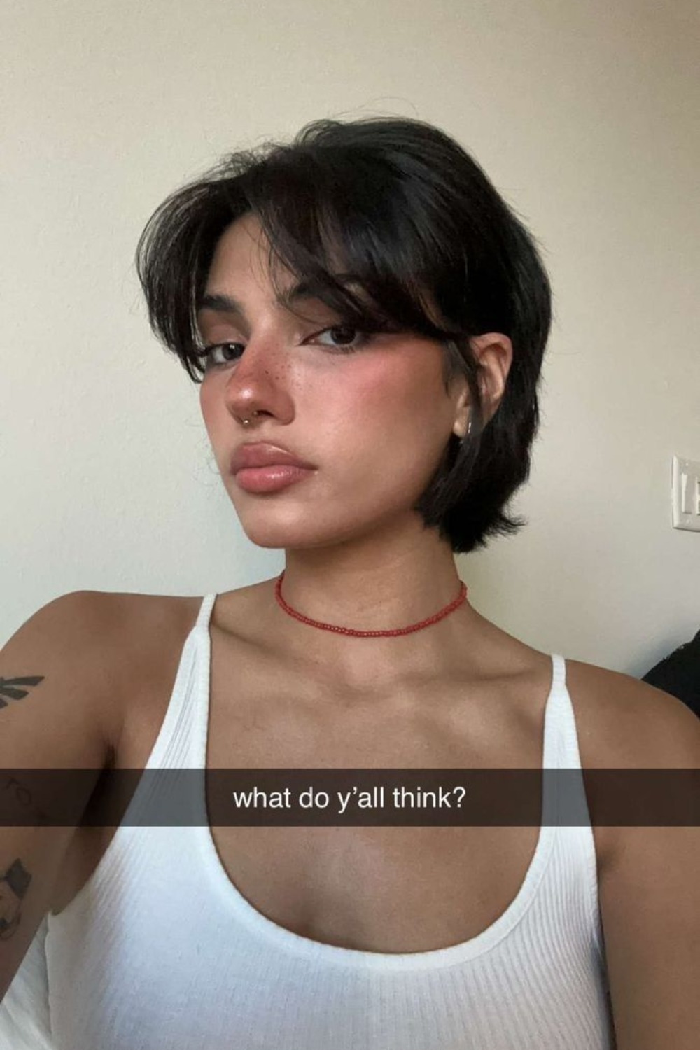 Short bob, curtain bangs, sleek finish
