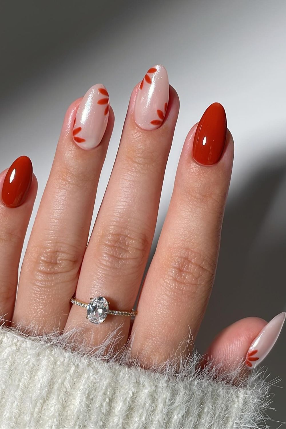 Rustic leaf nail art with warm autumn colors, seasonal manicure.