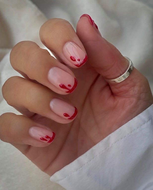 Short round nails with delicate red French tips