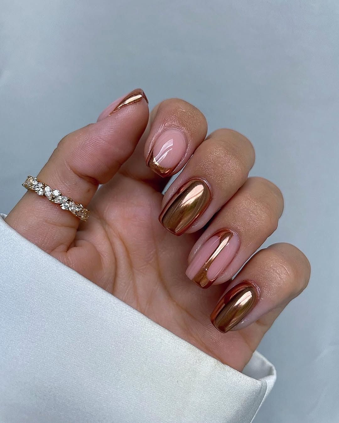 Metallic copper French nails, almond shape