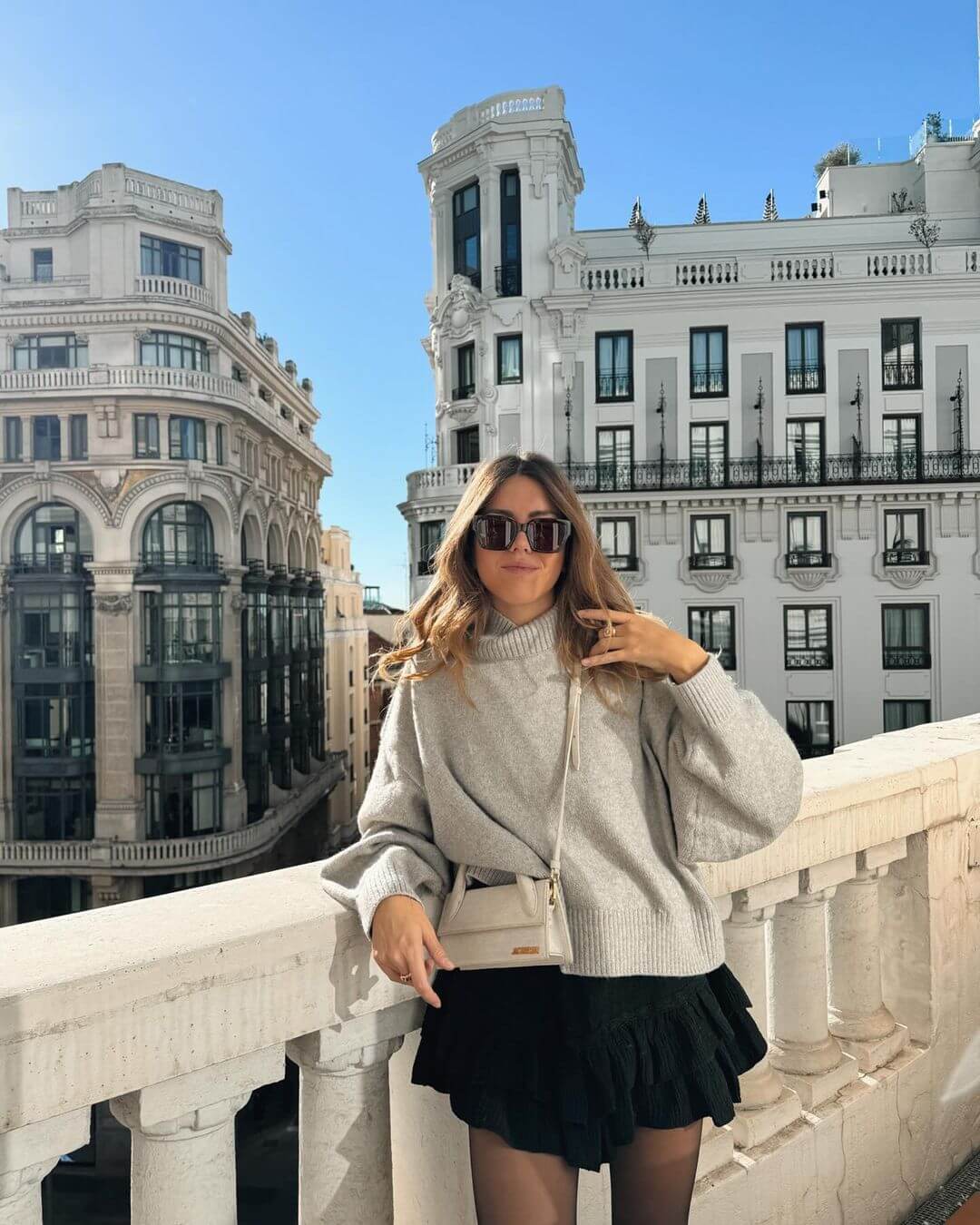 Oversized sweater with mini skirt