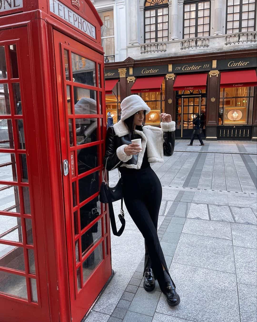 Shearling jacket with black outfit and boots