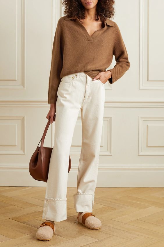 Beige sweater with cream jeans and loafers