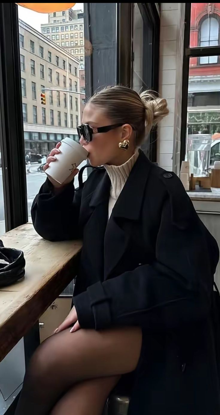 Black coat with turtleneck and tights