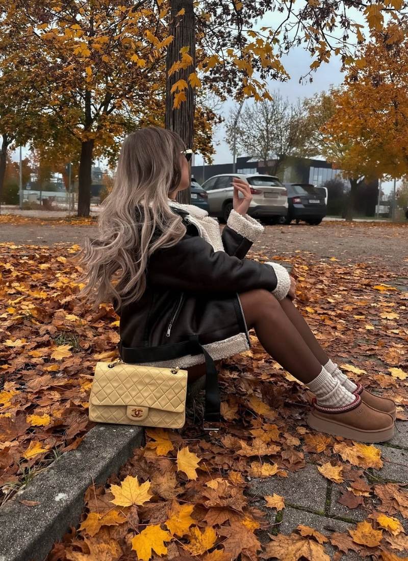 Shearling coat with tights and loafers