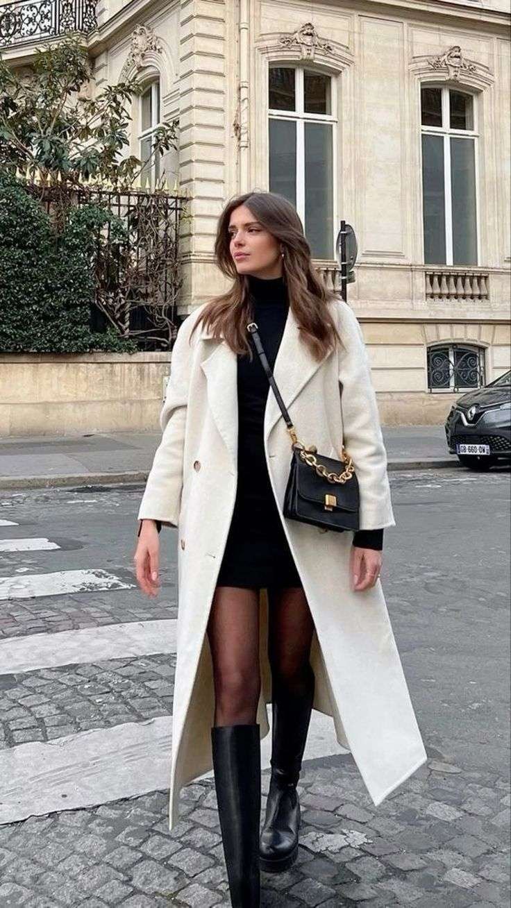 Long white coat with black dress and boots