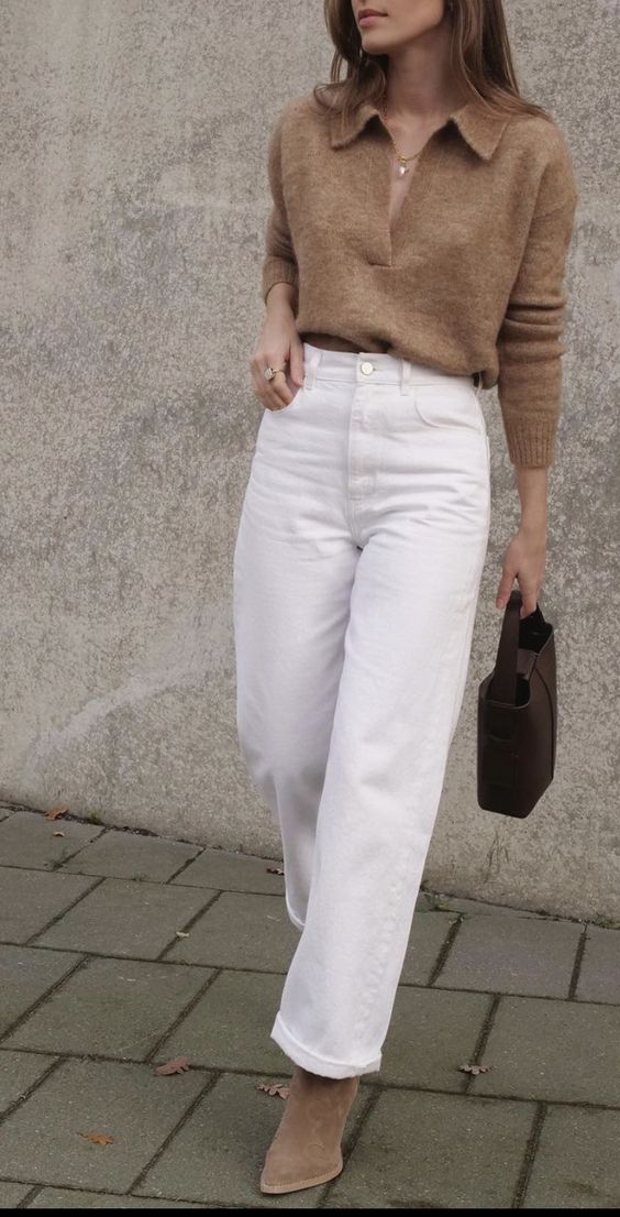 Brown sweater with white jeans and boots