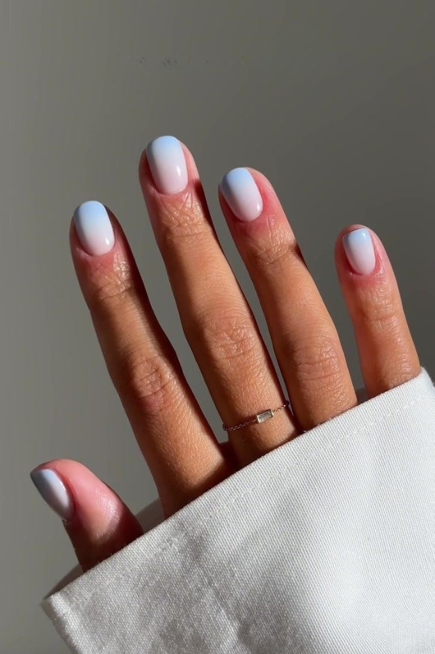 Gentle blue ombre square nails with a soft gradient, ideal for serene and dreamy styles.