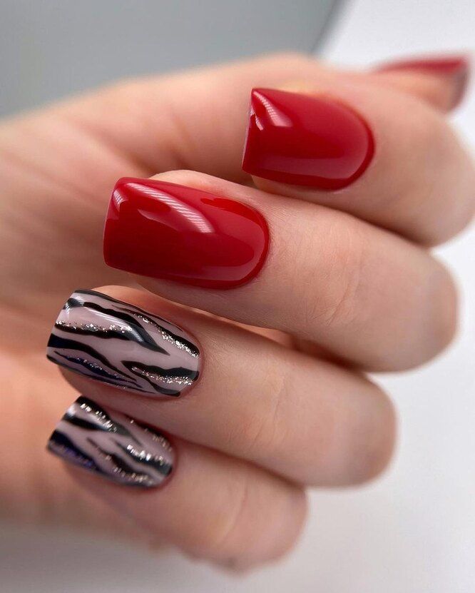 Red and zebra print square nails, ideal for bold and trendy styles.