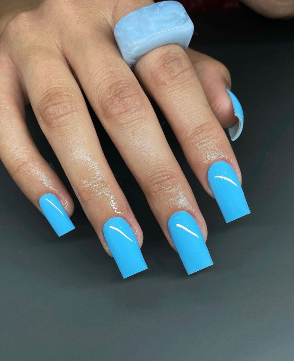 Glossy blue square nails, ideal for bold and striking styles.