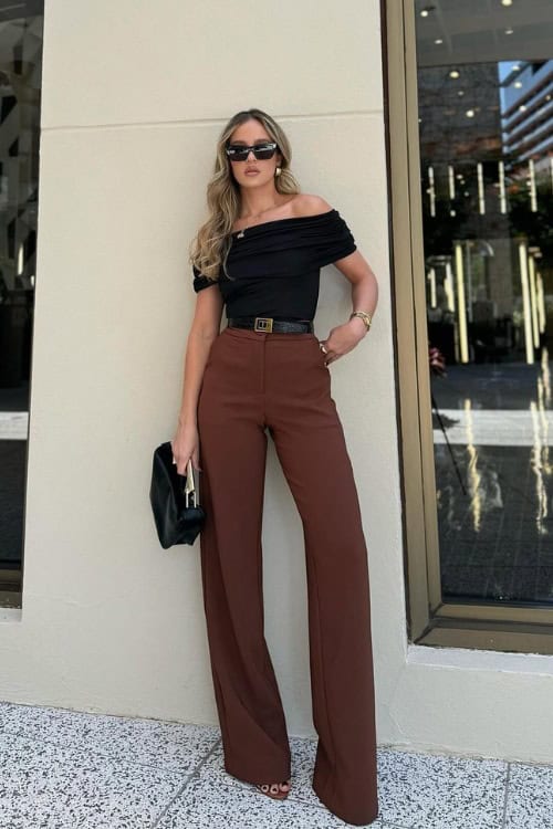 Bold outfit with off-shoulder top and wide-leg trousers