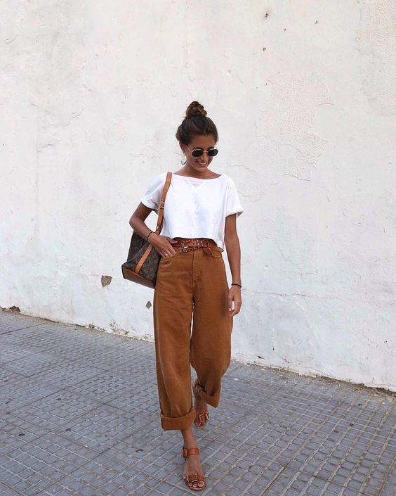 Casual chic with white tee and brown trousers