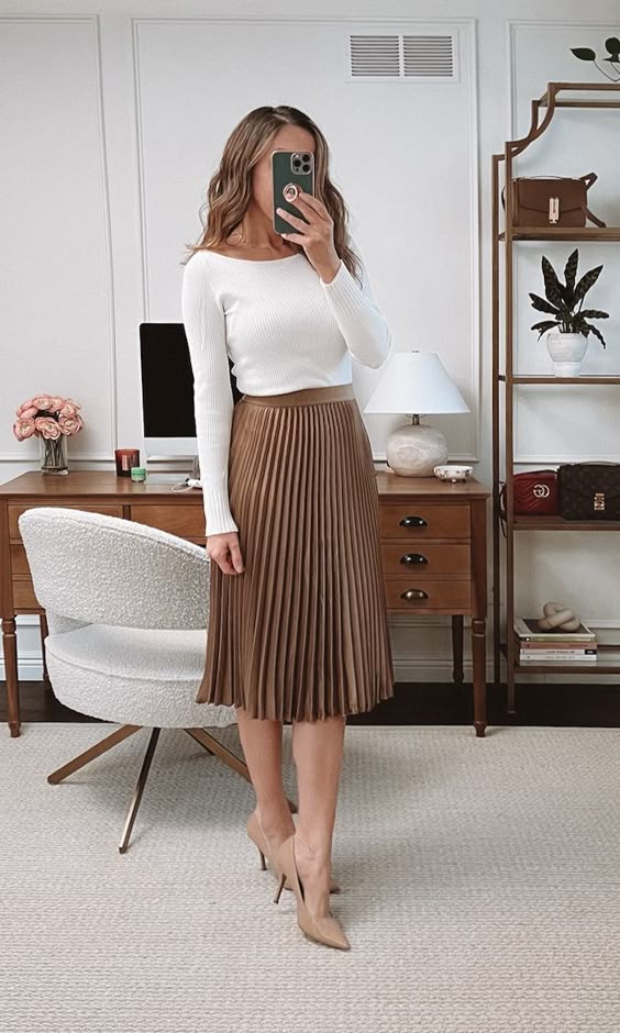 Classic pleated skirt with a modern top