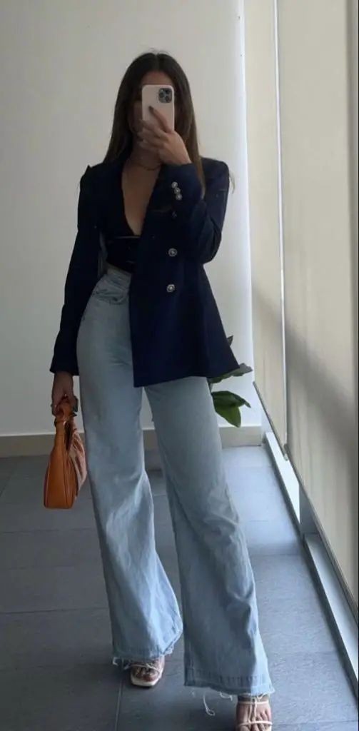 Bold blazer with light denim, strong contrast