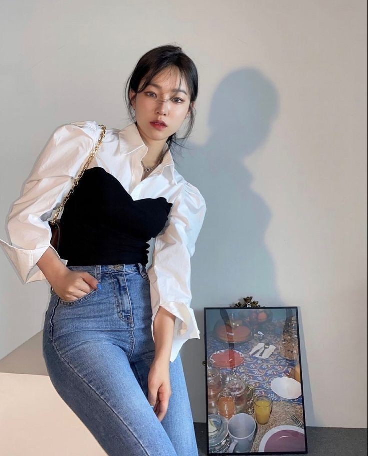 Layered blouse with denim jeans